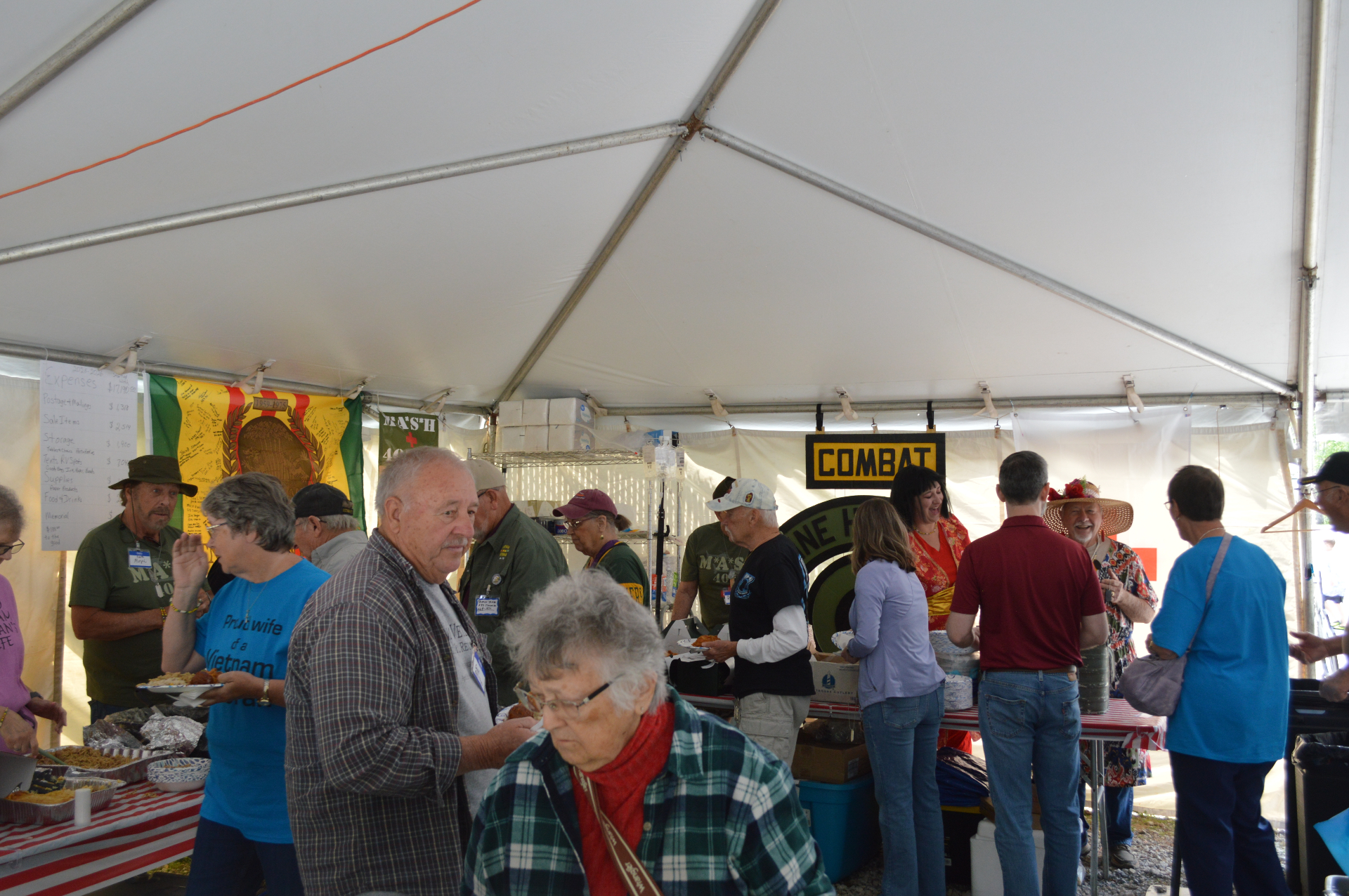 Veterans and families gathered under the food tent